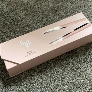 Brand New~Blush colored flat iron still in box.